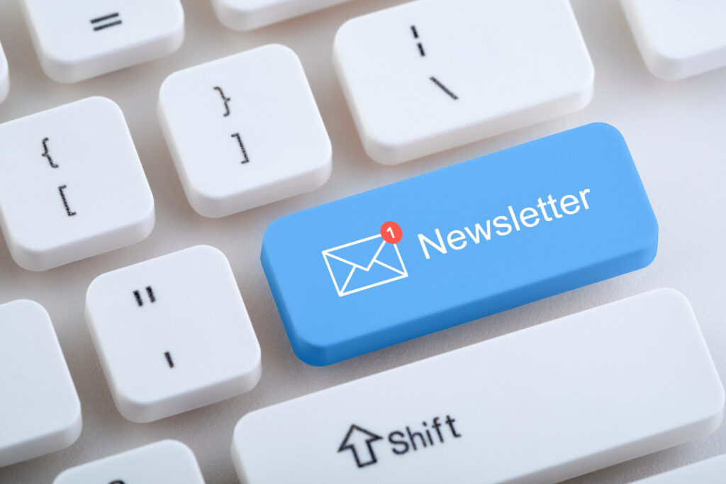 Computer keyboard with newsletter button